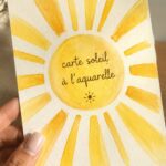 Carte soleil aquarelle : réalisez-la facilement Carte soleil réalisée en aquarelle, avec des couleurs vibrantes et des détails délicats.