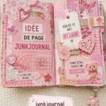 Page colorée d'un junk journal avec des embellissements roses assortis.