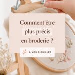 Améliorez votre précision en broderie facilement Une brodeuse concentrée sur son travail avec des fils colorés
