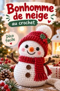 Un bonhomme de neige au crochet adorable avec écharpe et chapeau colorés.